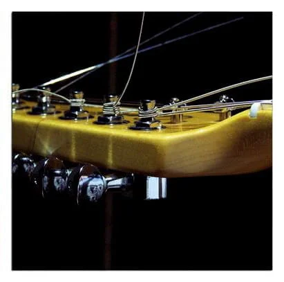 como colocar cuerdas guitarra